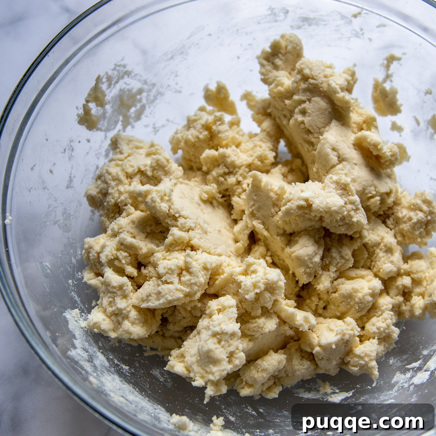biscuit dough in a large glass bowl.