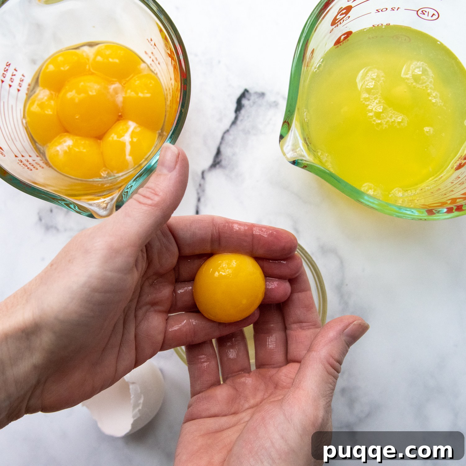 Pillowy Soft Gluten-Free Angel Food Delight 3 Expertly separating egg yolks and whites into different bowls.