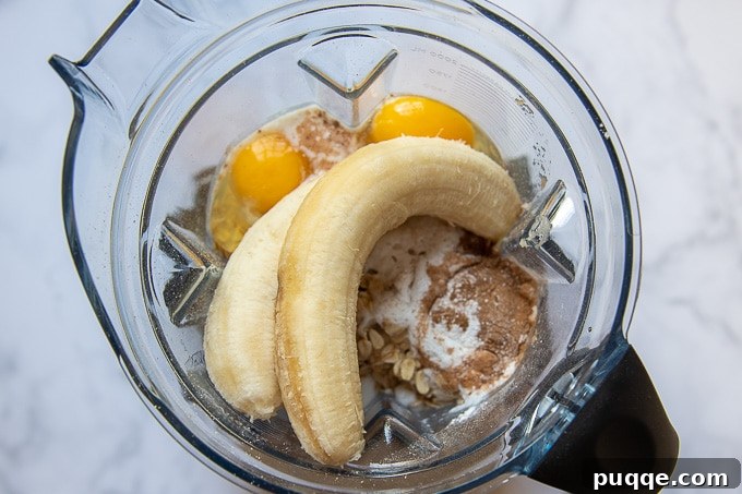 Wholesome Fluffy Gluten Free Banana Oatmeal Waffles 3 overhead shot of ingredients in blender to make flourless waffles