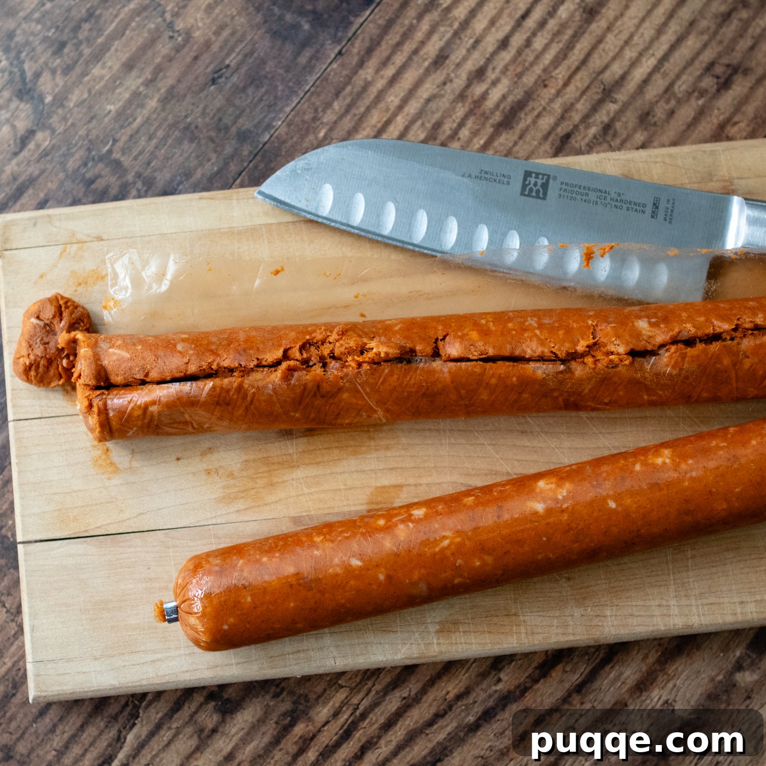 Signature Red Chicken Chorizo Chili 4 Chorizo casings being cut open to remove the sausage meat.