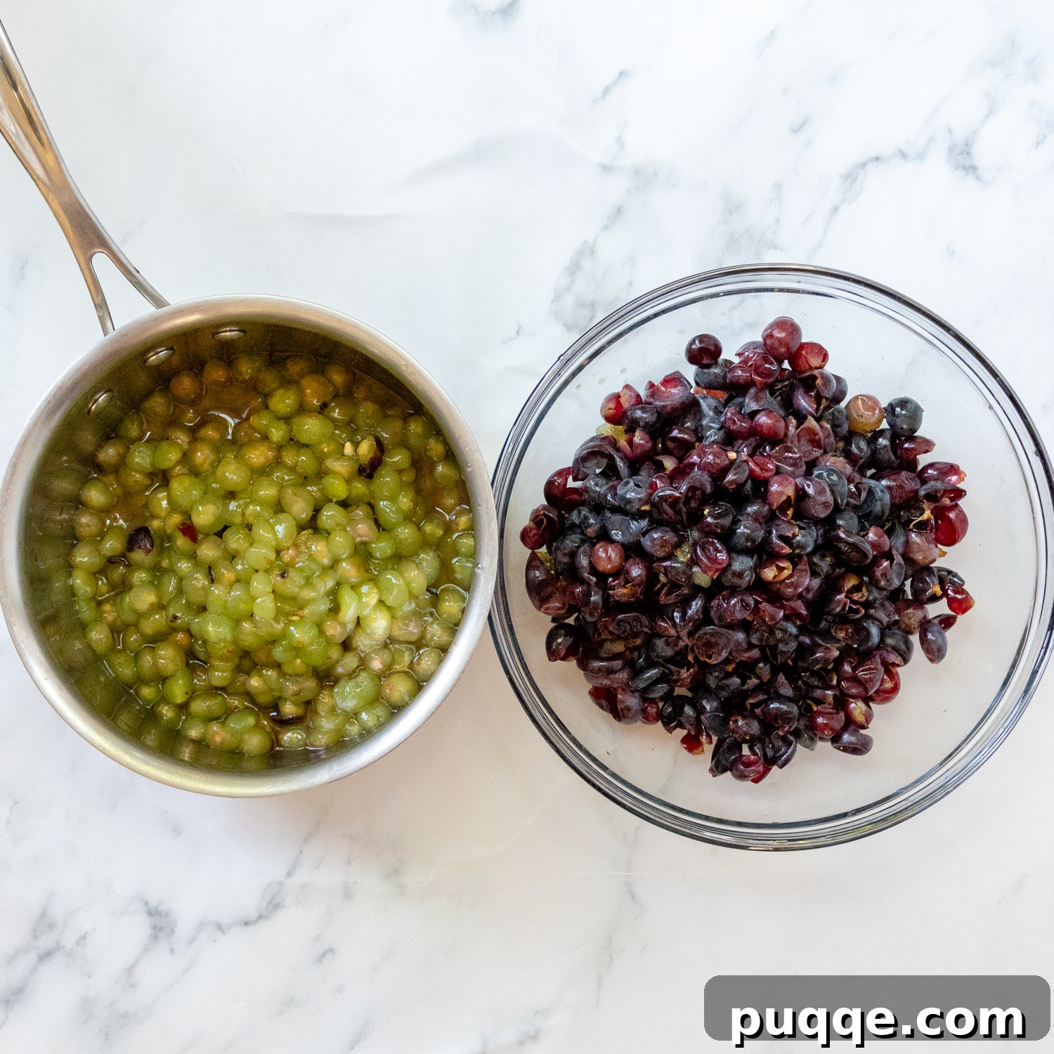 Classic Concord Grape Streusel Pie 3 The vibrant green pulp of Concord grapes collected in a saucepan, with the darker skins set aside in a glass bowl, ready for the next steps.