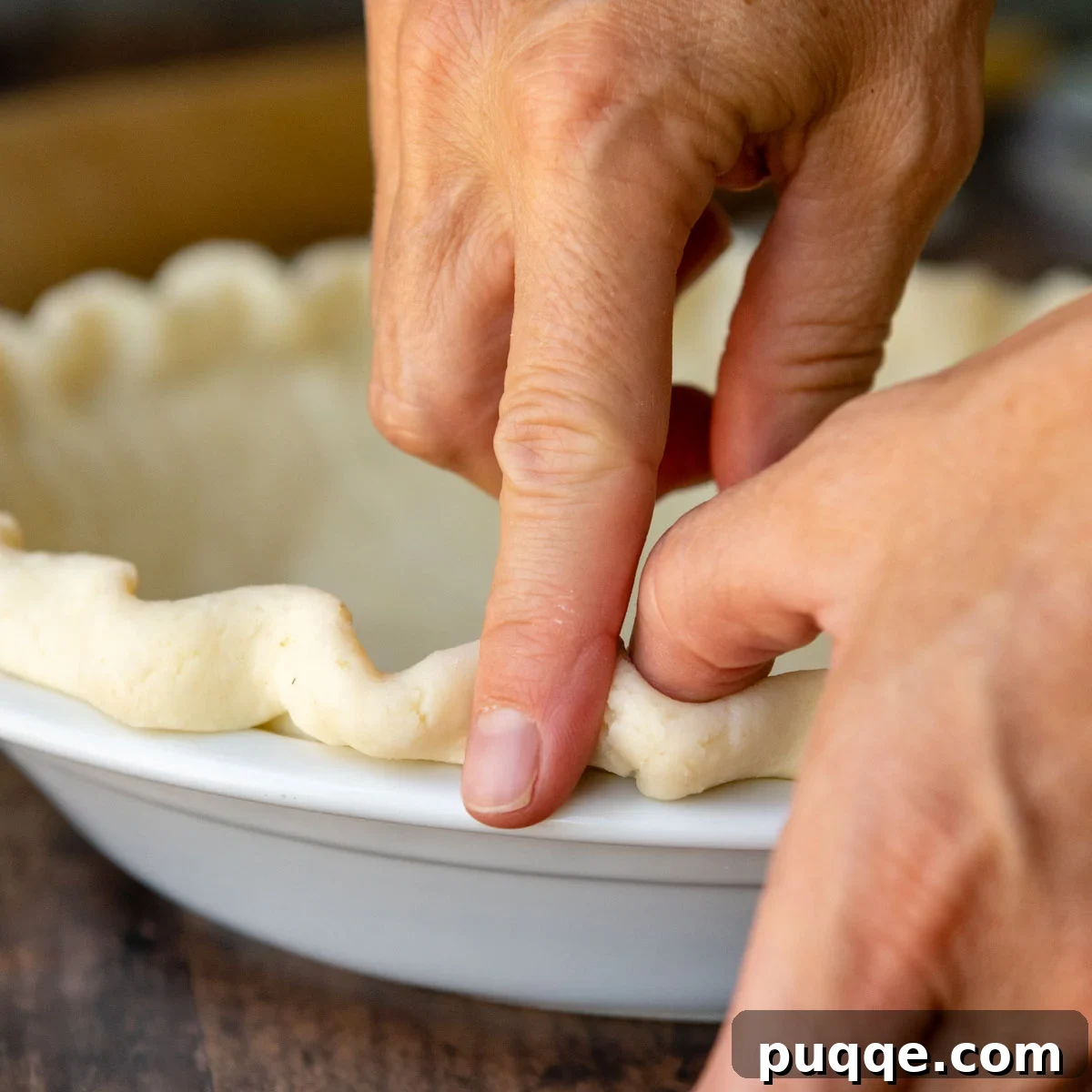 fingers making a decorative edge.