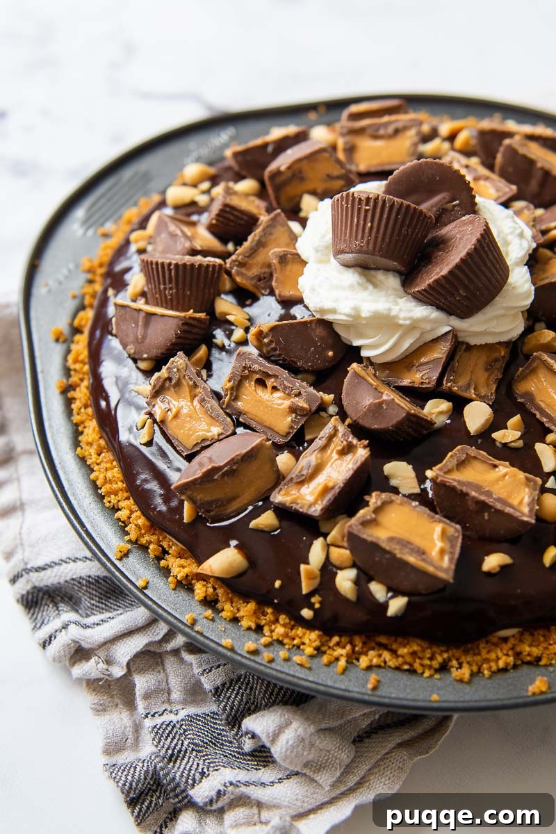 Effortless 5-Minute Gluten-Free Chex Pie Crust 4 A delectable chocolate peanut butter pie beautifully presented in a golden Chex pie crust, ready to be served.