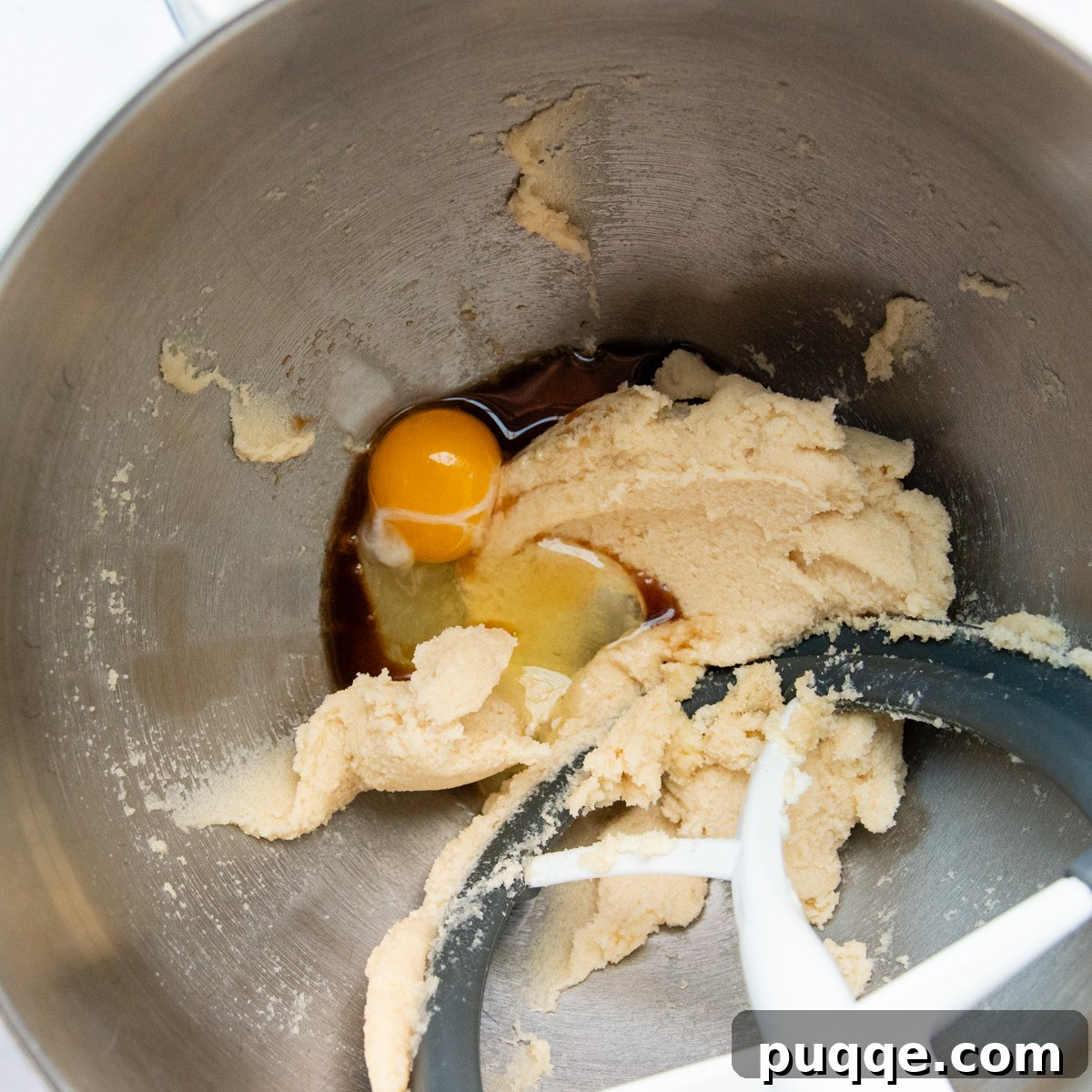 Softened butter creamed together with brown sugar and granulated sugar until light and fluffy.