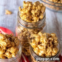 homemade caramel corn recipe in 3 glass jars