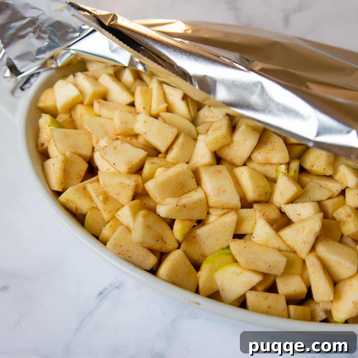 Easy Gluten Free Apple Cobbler with Fluffy Biscuit Topping 4 the apples partially covered with foil before baking.