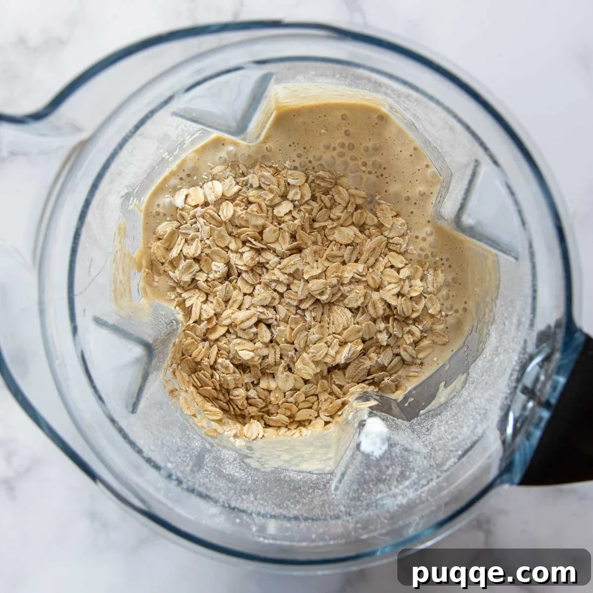 extra oats added to the oat flour bread batter in the blender, before final pulsing