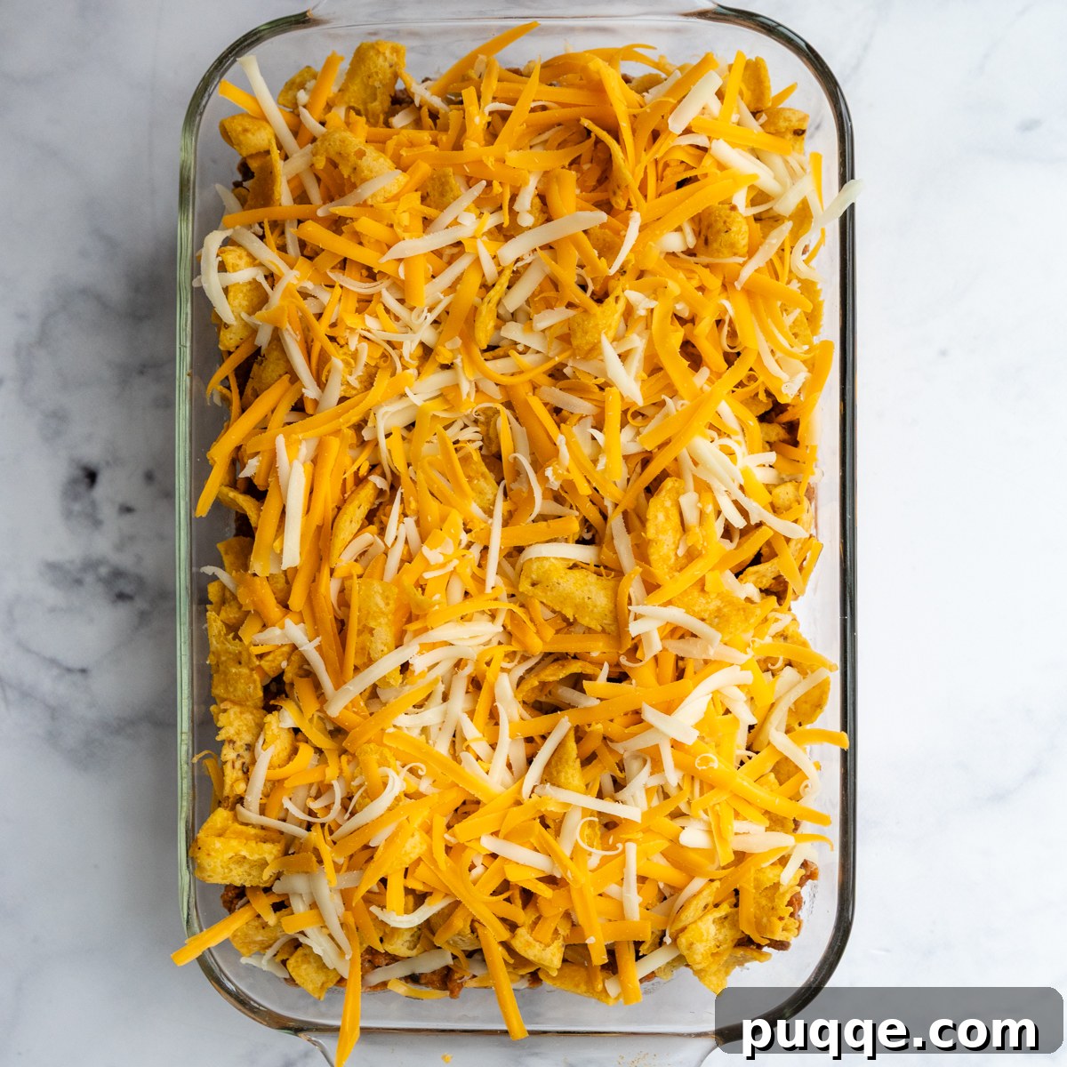 the casserole with Fritos and cheese on top before baking.