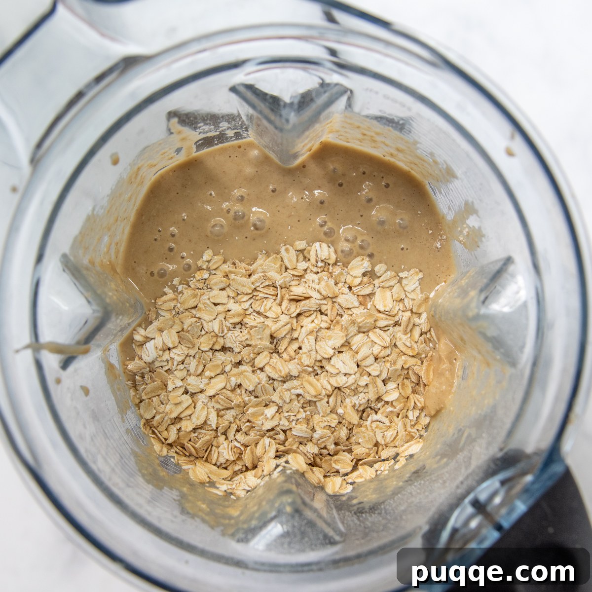 Quick Moist Oat Flour Banana Bread 5 oatmeal added to the bread batter in the blender.