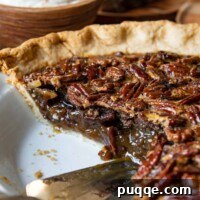 close up of pecan pie sliced into