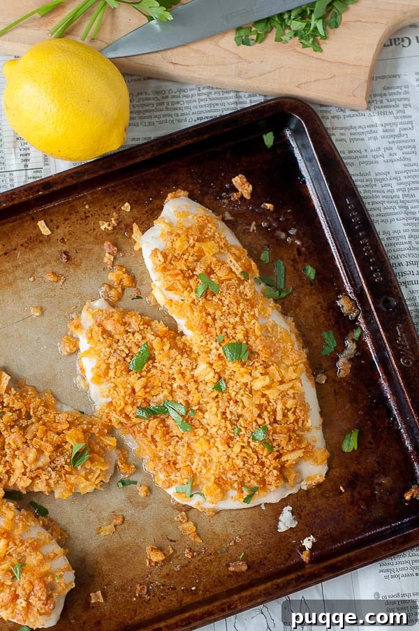Perfect Pairings 40 Simple Fish Side Dishes 3 an overhead shot of oven fried fish on a baking sheet