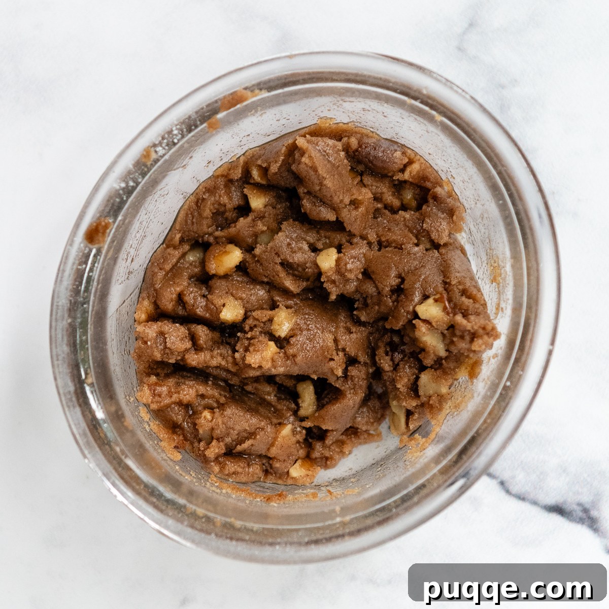 Cozy Gluten-Free Apple Cinnamon Crumble Bread 3 a small glass bowl containing the golden, crumbly streusel topping, ready to adorn the apple bread
