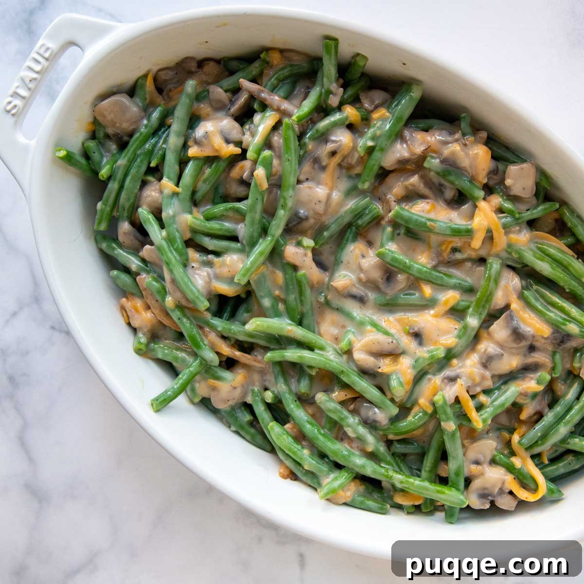 Hearty Homestyle Gluten-Free Green Bean Bake 6 A freshly baked gluten-free green bean casserole, golden and bubbly, topped with crispy onions.
