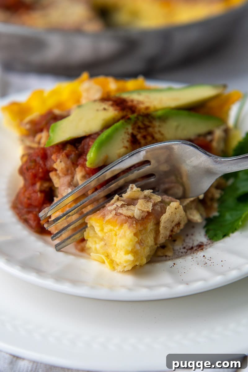a fork cutting into a slice
