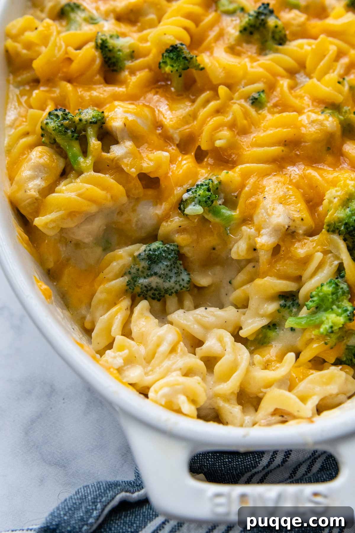 Hearty Chicken Broccoli Pasta Bake 6 close up of the inside of the pasta casserole with a scoop taken out, highlighting the creamy texture
