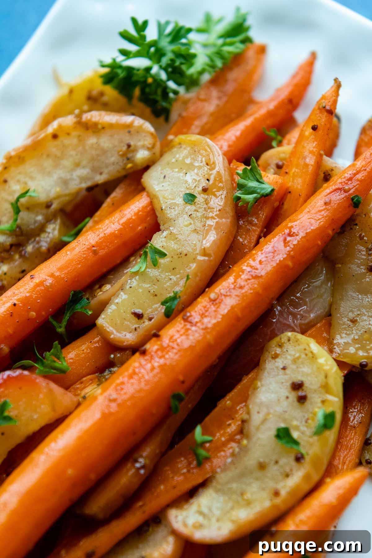 A delightful carrot and apple side dish, beautifully plated.