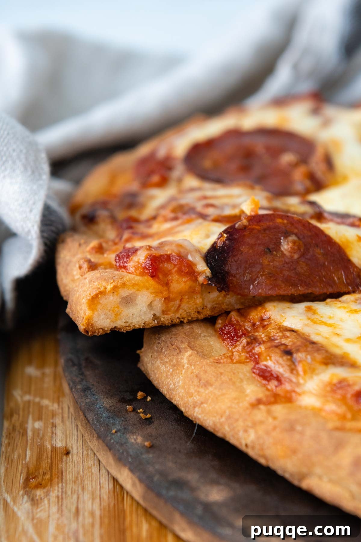 Perfectly Crispy Chewy No Knead Gluten-Free Pizza Crust 8 close up of the gluten-free pizza crust edge