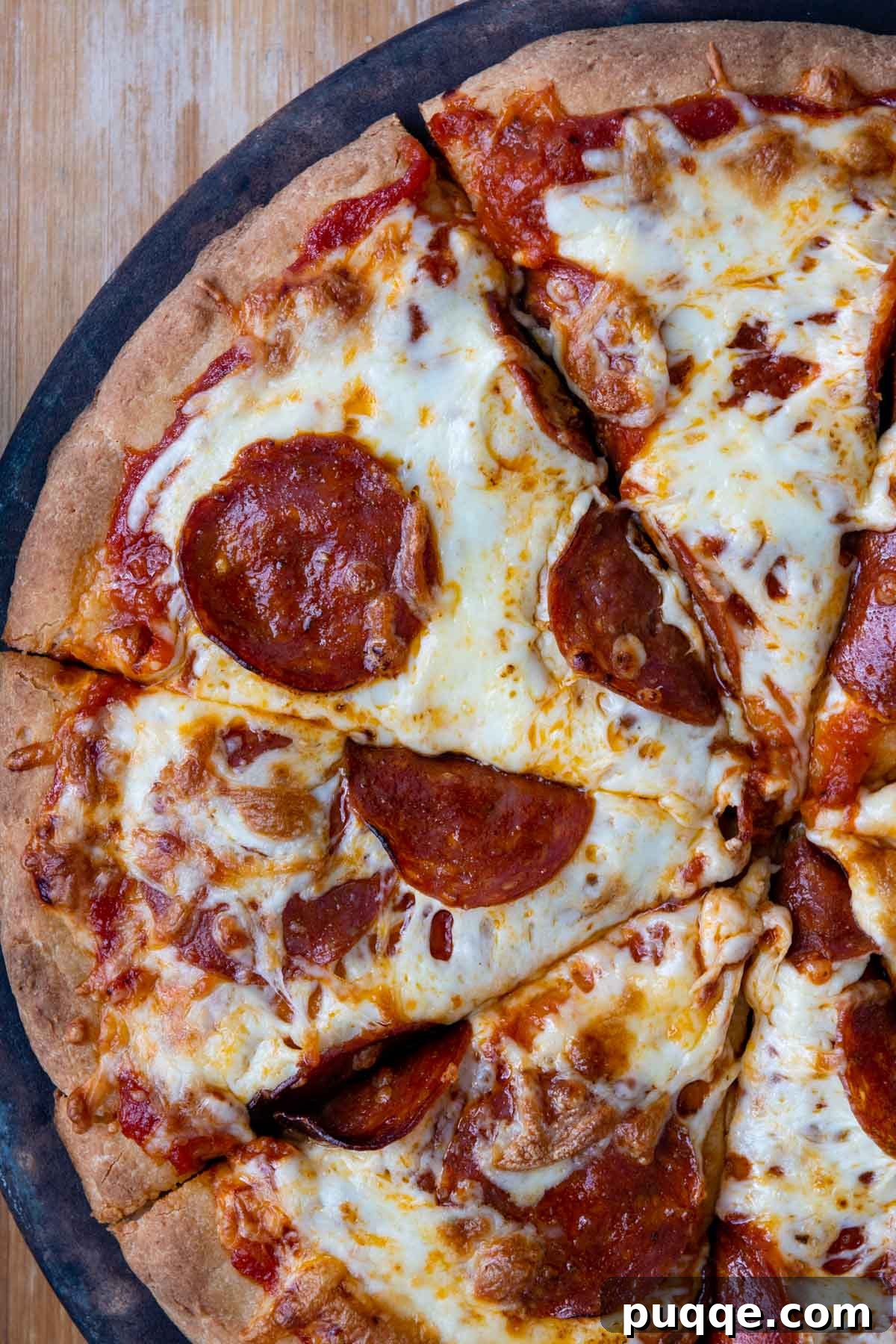 Perfectly Crispy Chewy No Knead Gluten-Free Pizza Crust 9 overhead shot of pepperoni pizza sliced