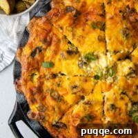 An overhead shot of a whole crustless quiche, expertly cut into slices, ready for serving.