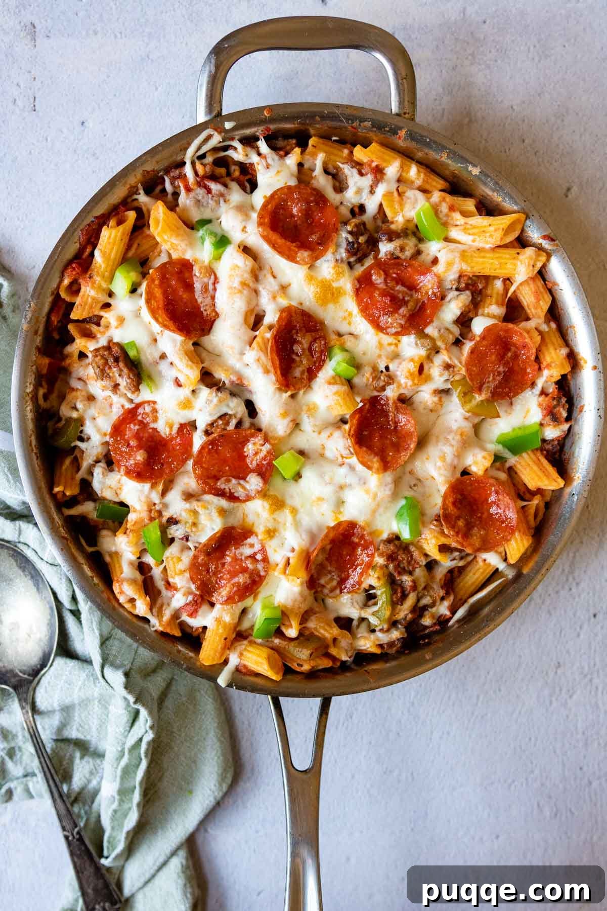 Speedy Supreme Skillet Pizza Pasta 6 Overhead shot of the finished Supreme Pizza Pasta Skillet, adorned with perfectly melted cheese and crisp pepperoni slices, ready to be served.