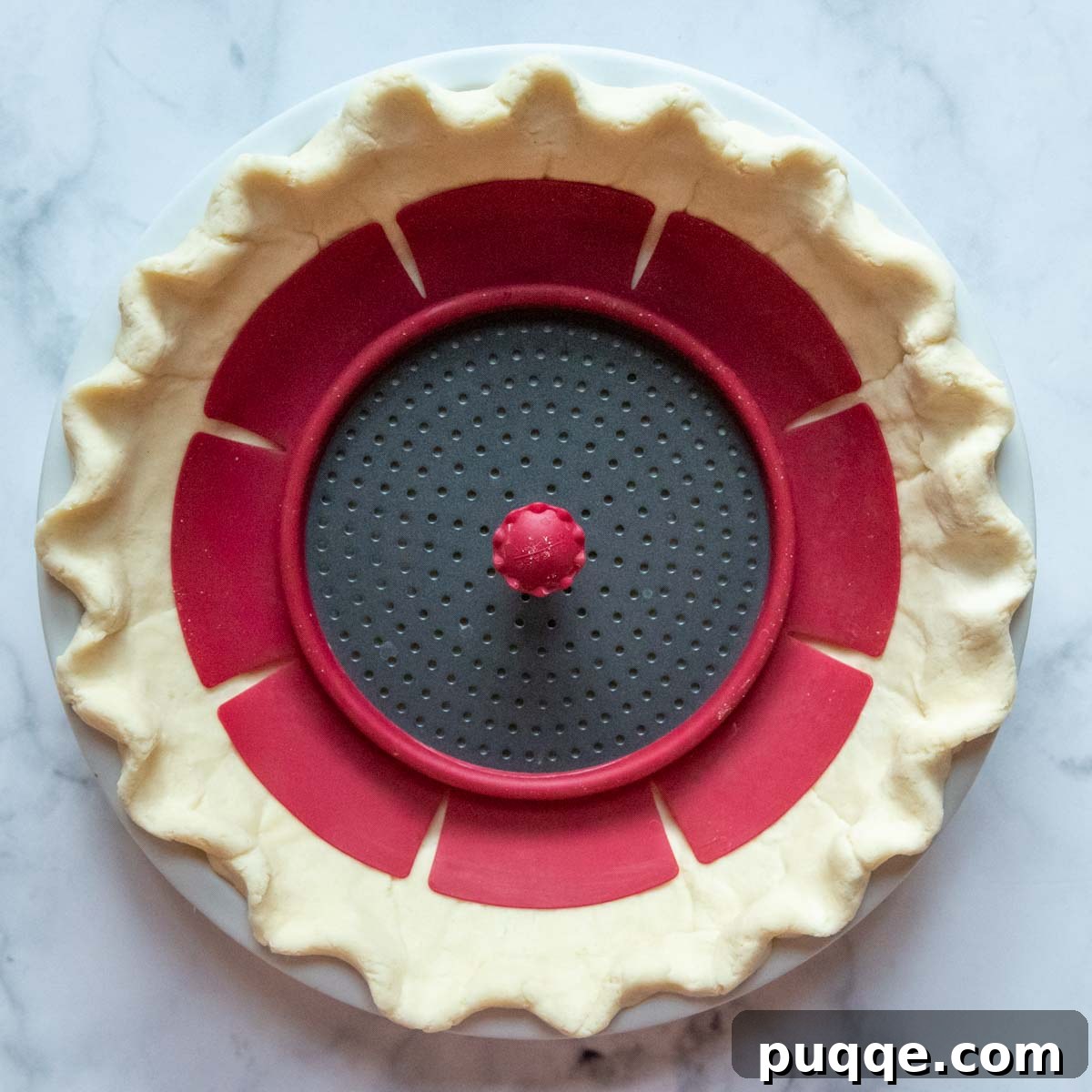Southern Soul Gluten-Free Sweet Potato Pie with a Flaky Golden Crust 4 a pie weight in an unbaked pie crust.