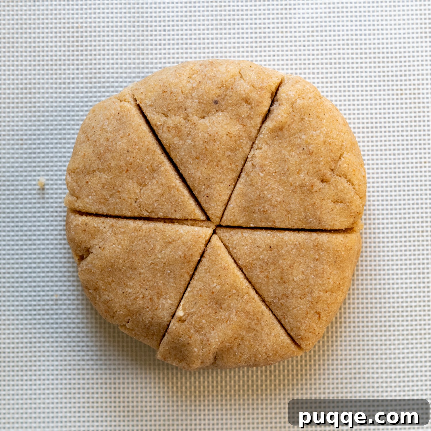 The dough after initial mixing, showing a soft, cohesive texture forming.