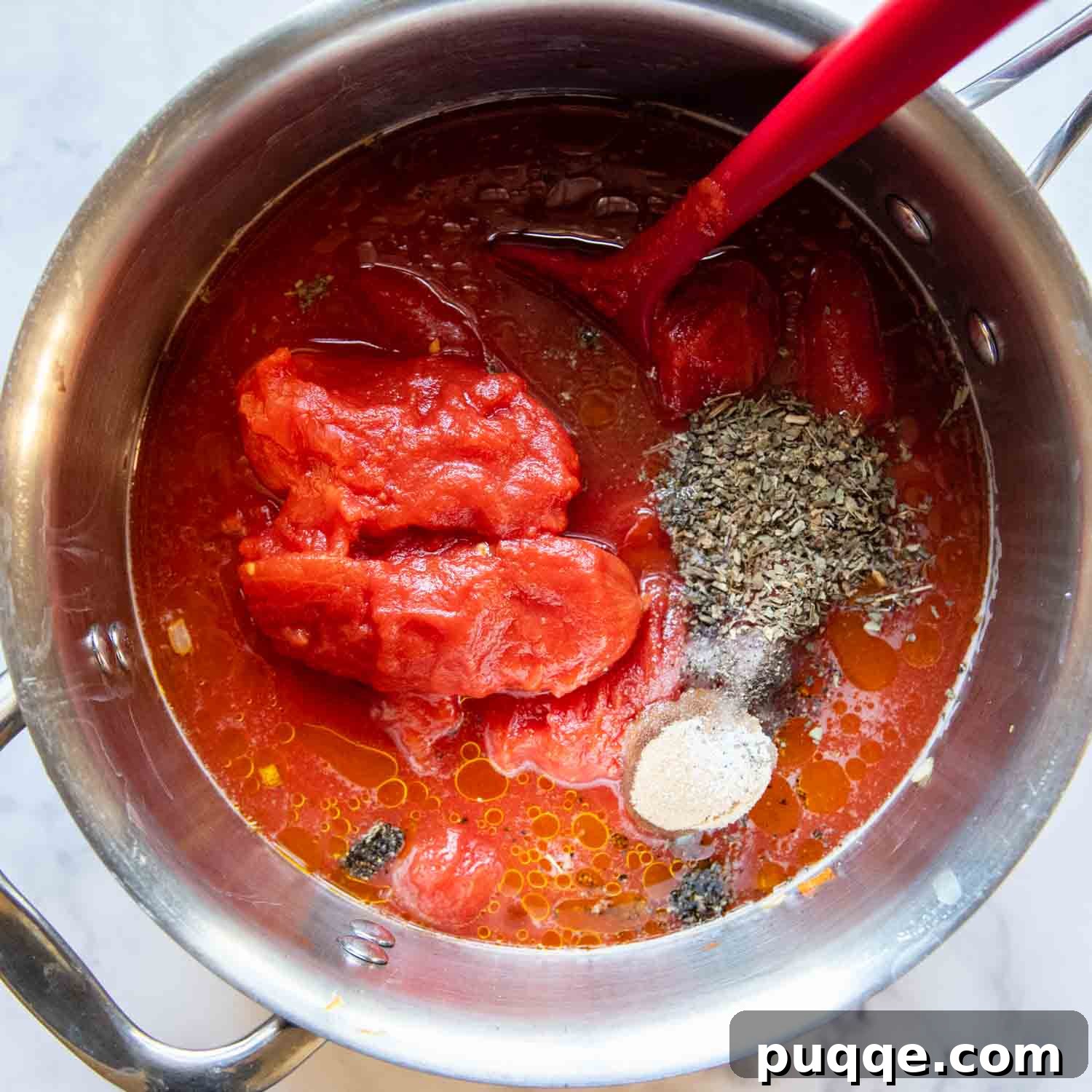 Amazing Gluten-Free Tomato Soup From Your Pantry 4 Whole peeled tomatoes, water, tomato paste, and seasonings added to the pot.