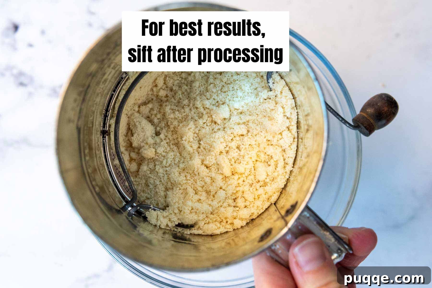 9 Steps to Super Fluffy Almond Flour 5 A sifter with finely ground almond flour, demonstrating the sifting process.