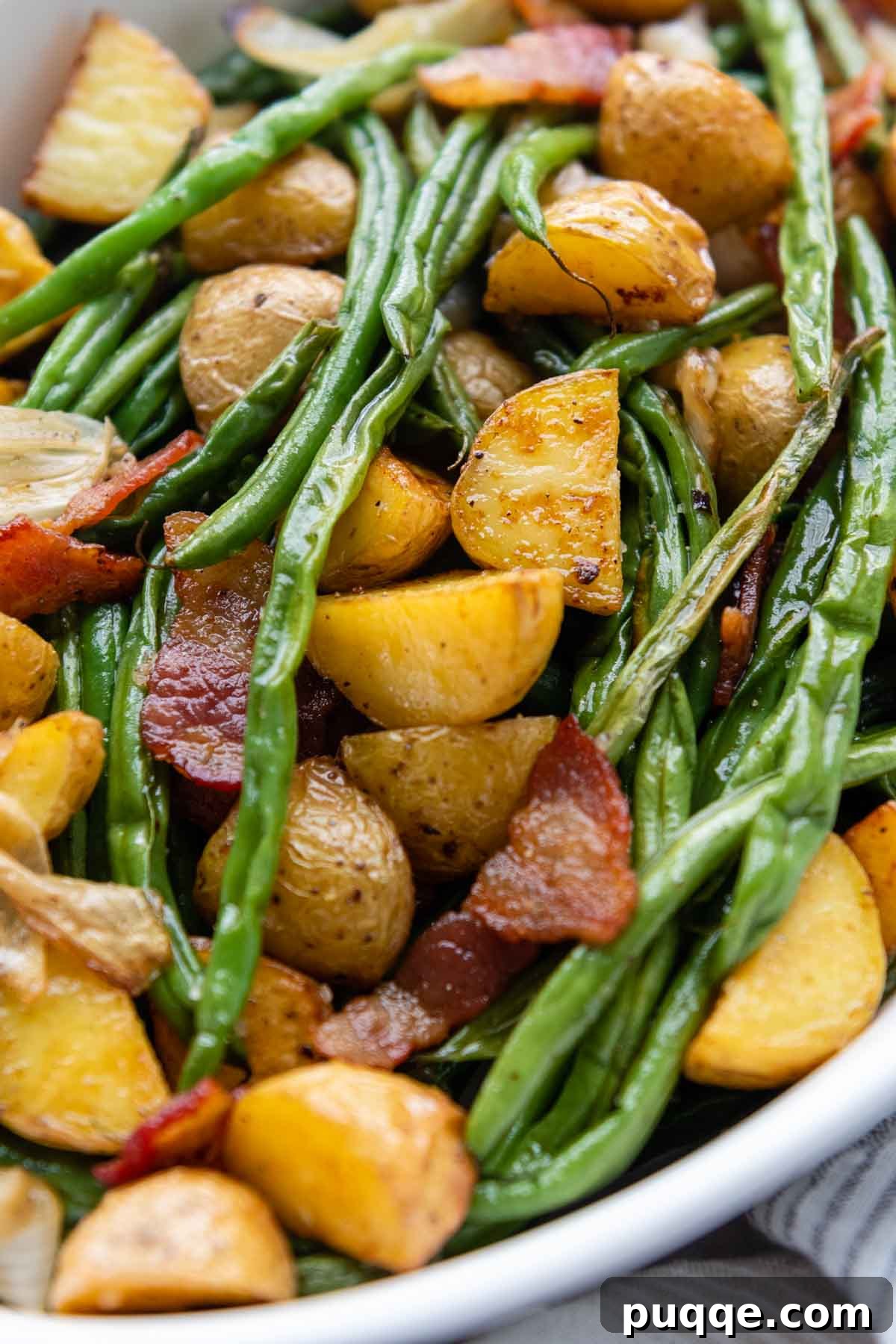 The Ultimate Guide to 50+ Easy Salisbury Steak Sides 4 close up of bean and potato side dish.