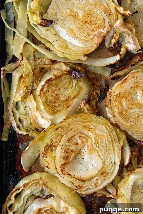 The Ultimate Guide to 50+ Easy Salisbury Steak Sides 9 overhead shot of roasted cabbage on a baking sheet