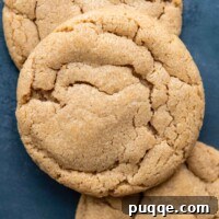 Melt-in-Your-Mouth Gluten-Free Peanut Butter Cookies 8 gluten free peanut butter cookie on stack of others.