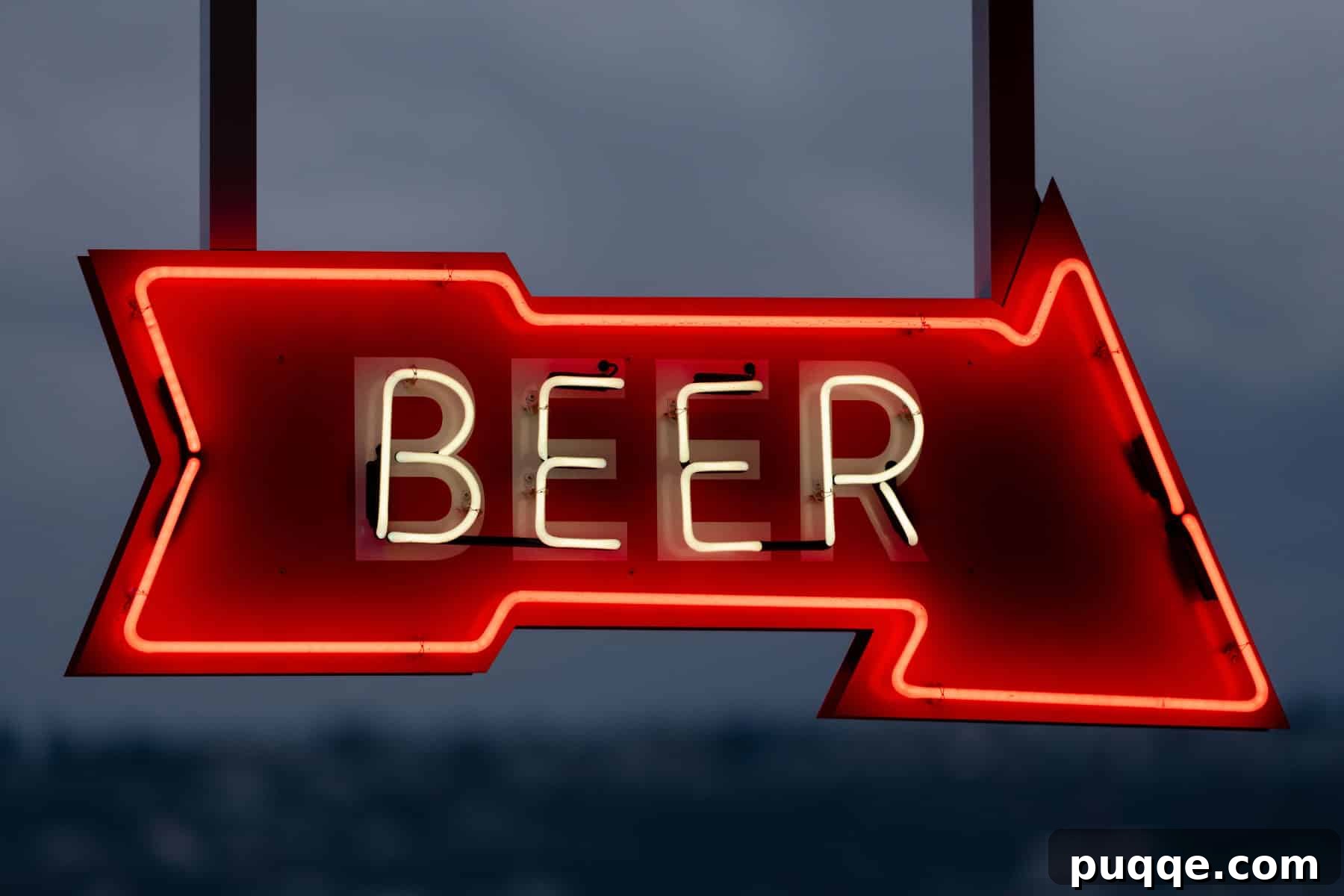 A vibrant neon beer sign illuminating a cozy bar scene, inviting guests to enjoy a cold brew.