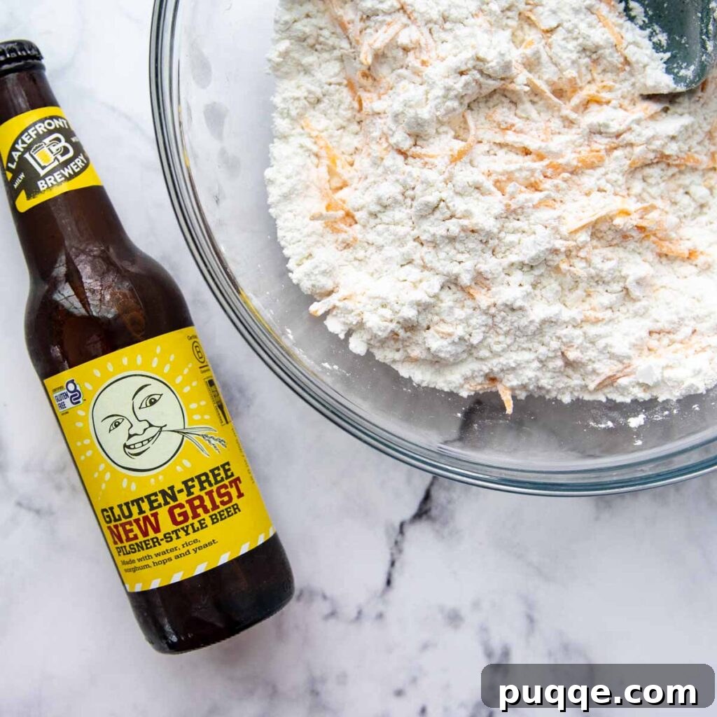 Quick Cheesy Gluten Free Beer Bread 4 a bottle of gluten free beer next to the mixing bowl.
