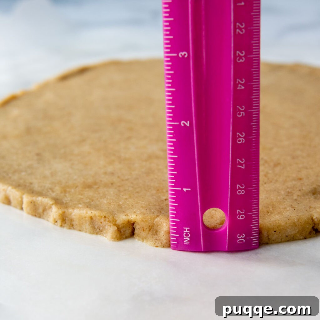 Ruler showing the thickness of the pizza crust, approximately 1/4 to 1/2 inch thick.