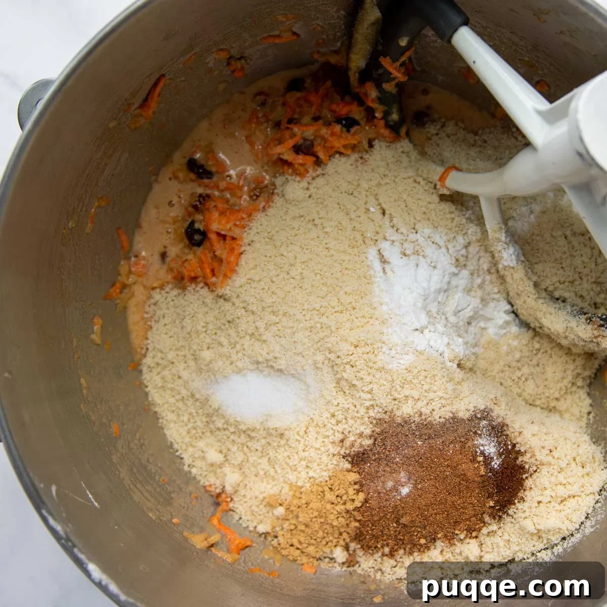 Cloud-Like Gluten-Free Almond Flour Carrot Cake 6 The dry ingredients added to the thick cake batter.