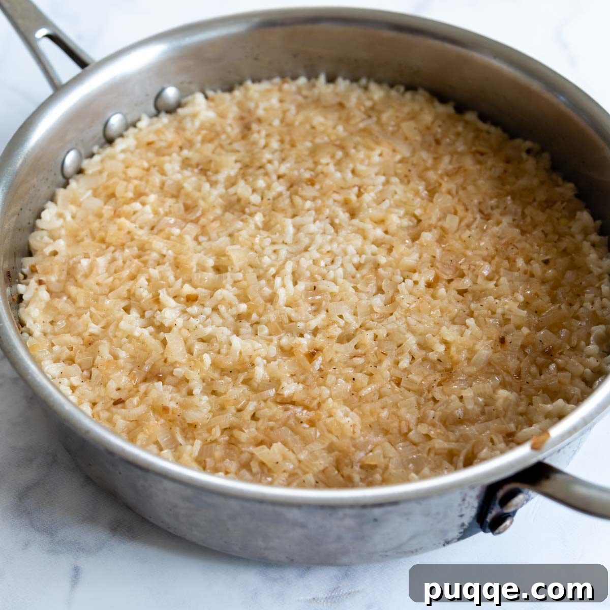 the cooked risotto in a pan after it has come out of the oven.