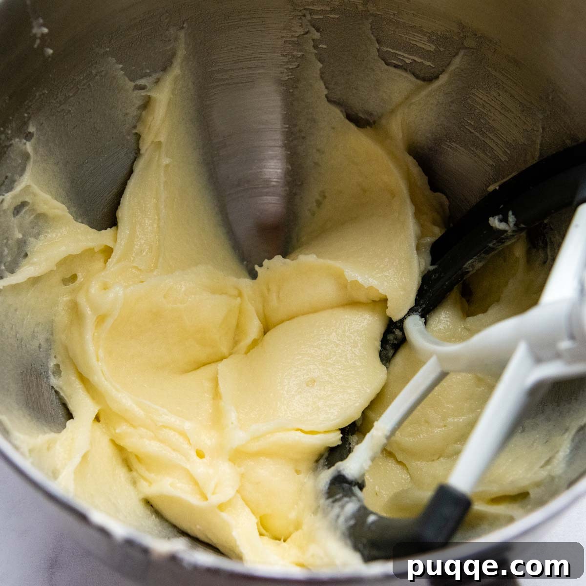 The Secret to Unbelievably Moist Gluten-Free Pound Cake 3 The perfectly creamed mixture of butter, cream cheese, and sugar, light and airy, ready for the next steps.