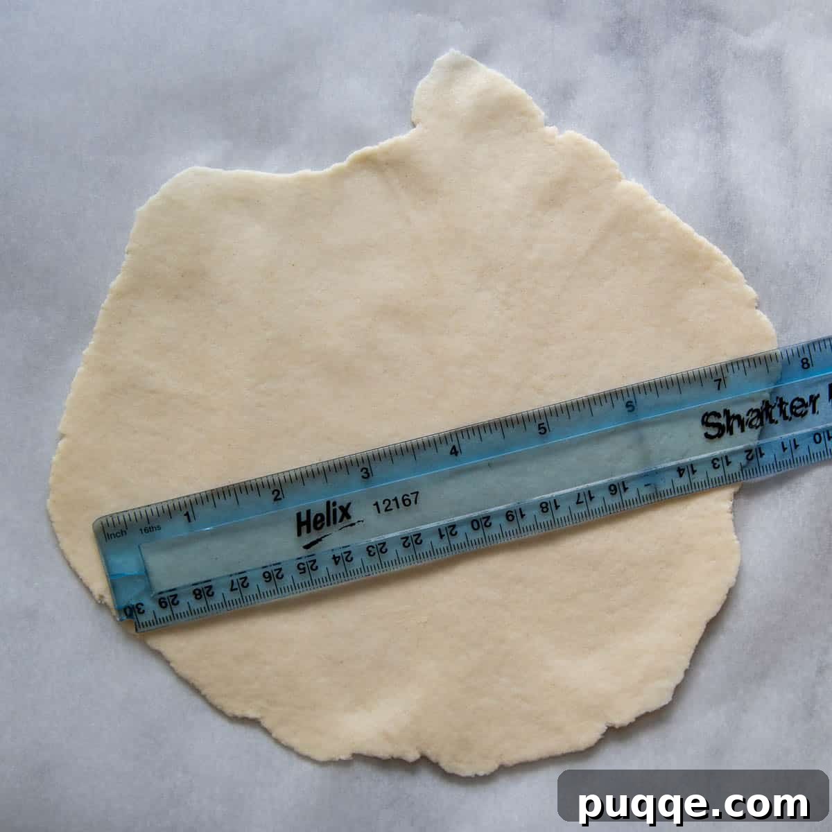 A rolled gluten-free tortilla with a ruler on it, showing the ideal 6.5-inch diameter.