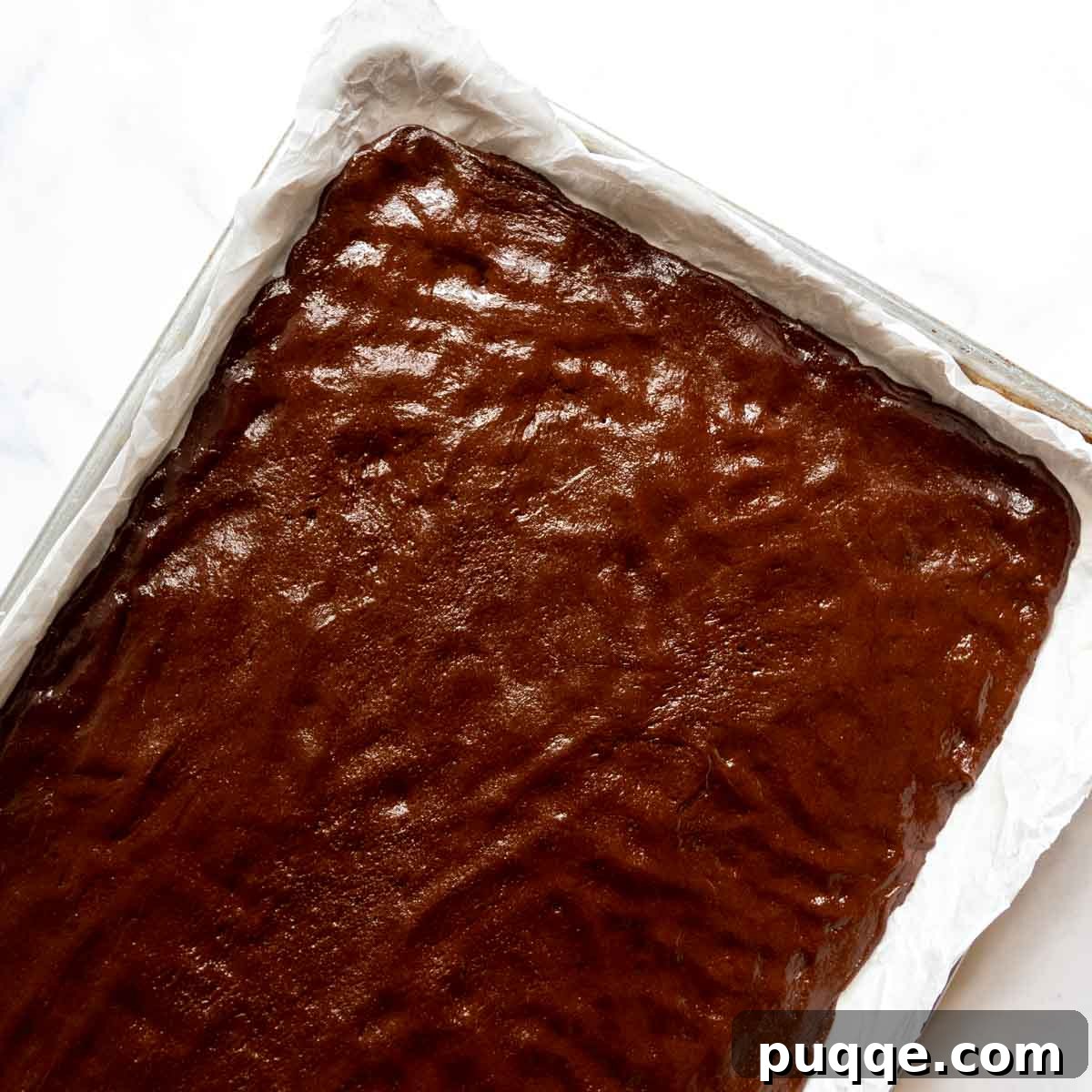 The Ultimate Gluten Free Ice Cream Sandwiches 6 Unbaked chocolate wafer bars evenly spread in a baking pan, ready for the oven.
