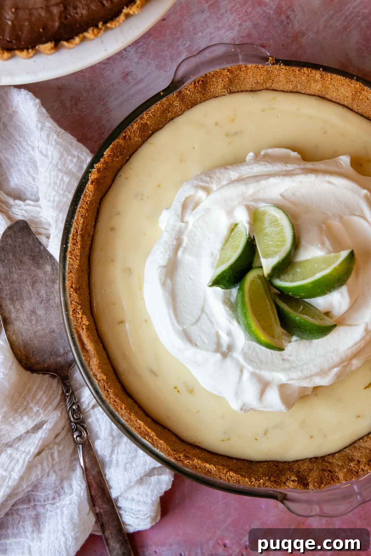 Quick Gluten Free Graham Cracker Crust Ready in 15 Minutes 4 overhead of key lime pie on a pink background.