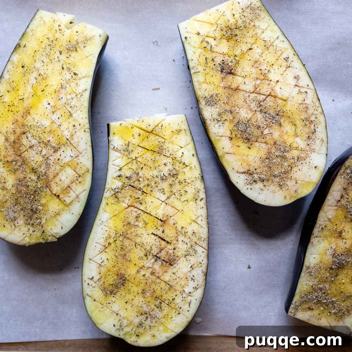 Hearty Gluten-Free Sausage-Filled Eggplant Boats 4 cut eggplant with olive oil and seasonings.