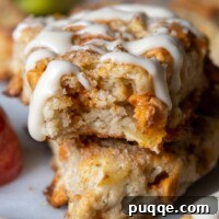 A scone facing straight on with a bite taken out.