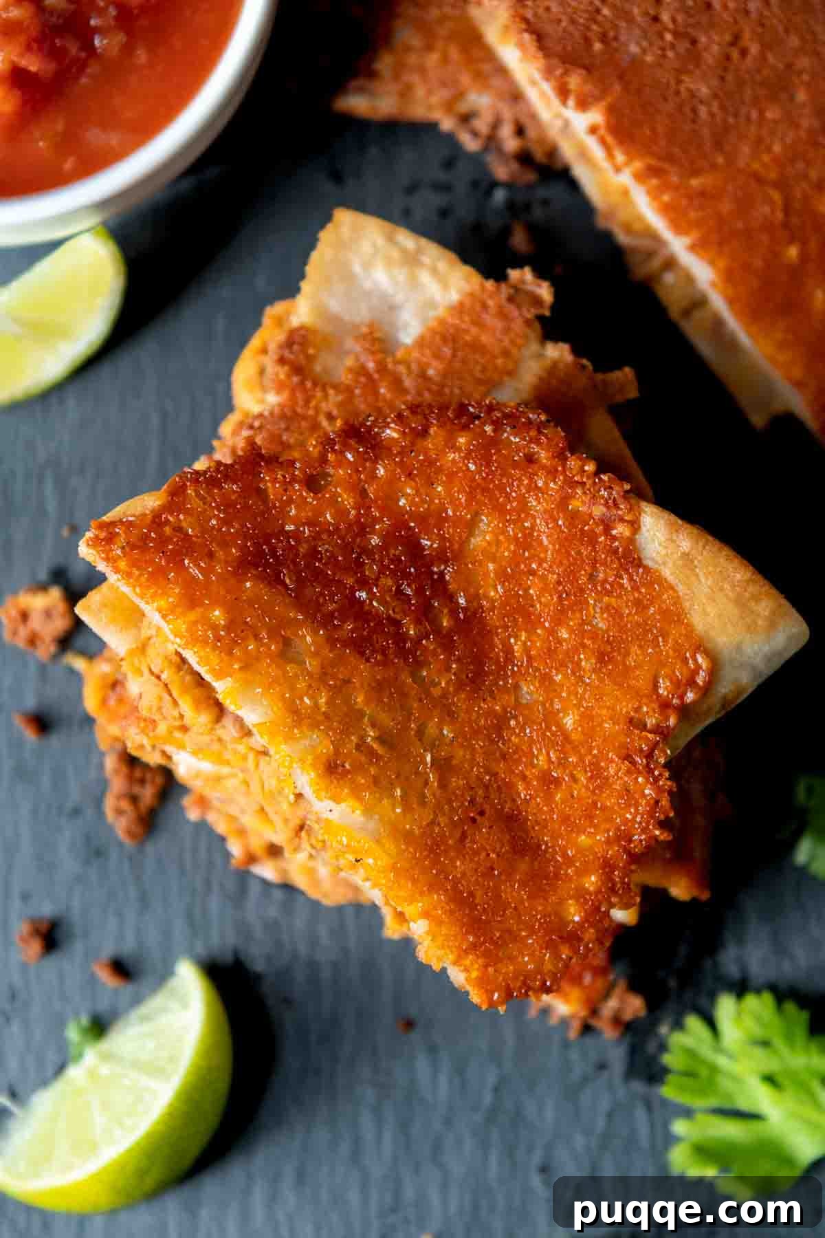 10-Minute Gluten-Free Cheesy Crunchwrap Quesadillas 8 top view of a golden, crispy cheese-crusted quesadilla.
