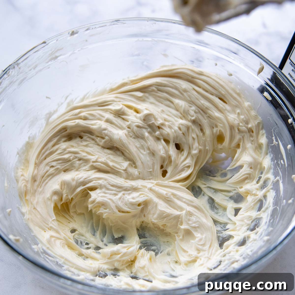 Perfect Overnight Gluten-Free French Toast Casserole 3 Cream cheese mixture in a bowl, ready for the casserole.