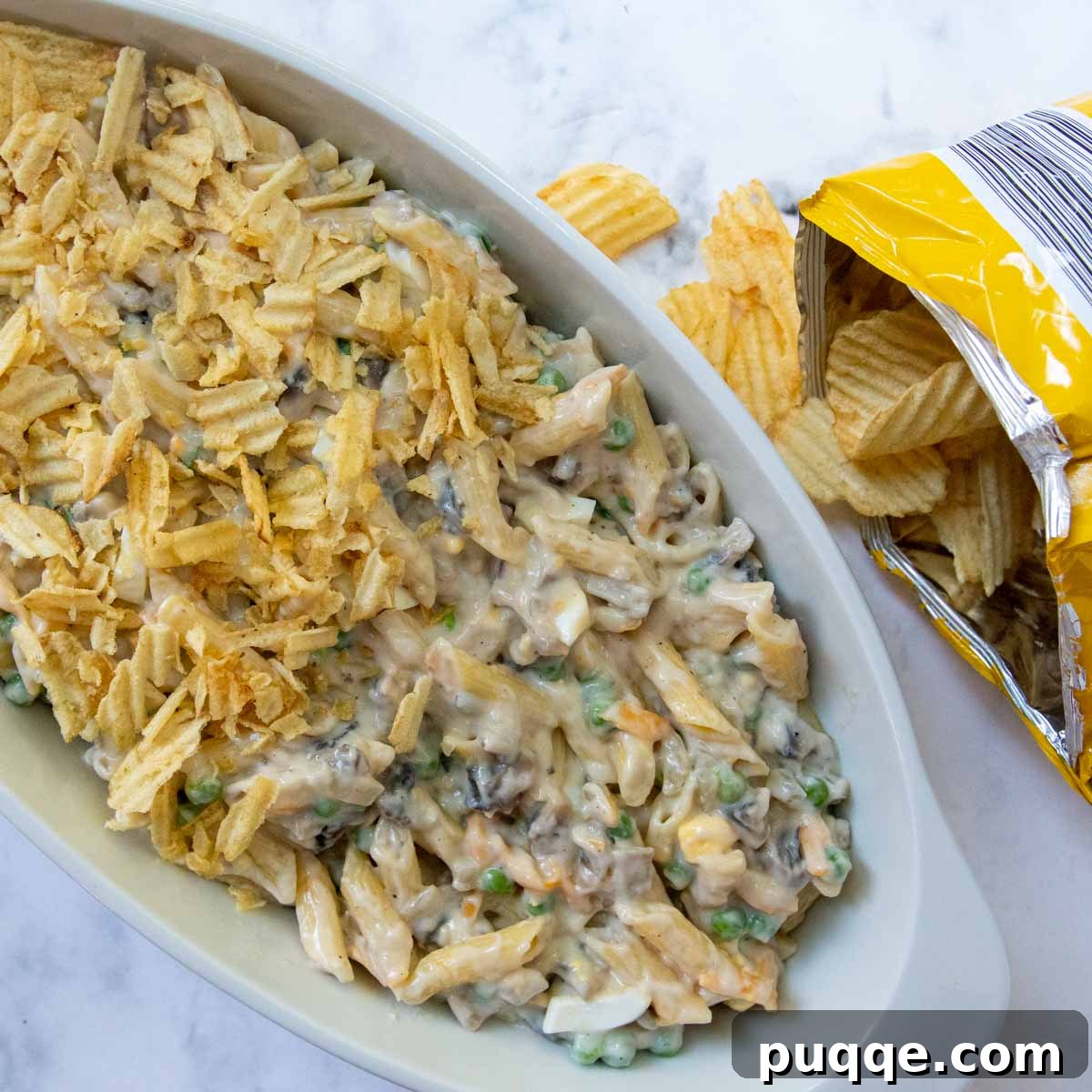 Wholesome Gluten-Free Tuna Noodle Casserole 5 unbaked tuna casserole with potato chips on top.