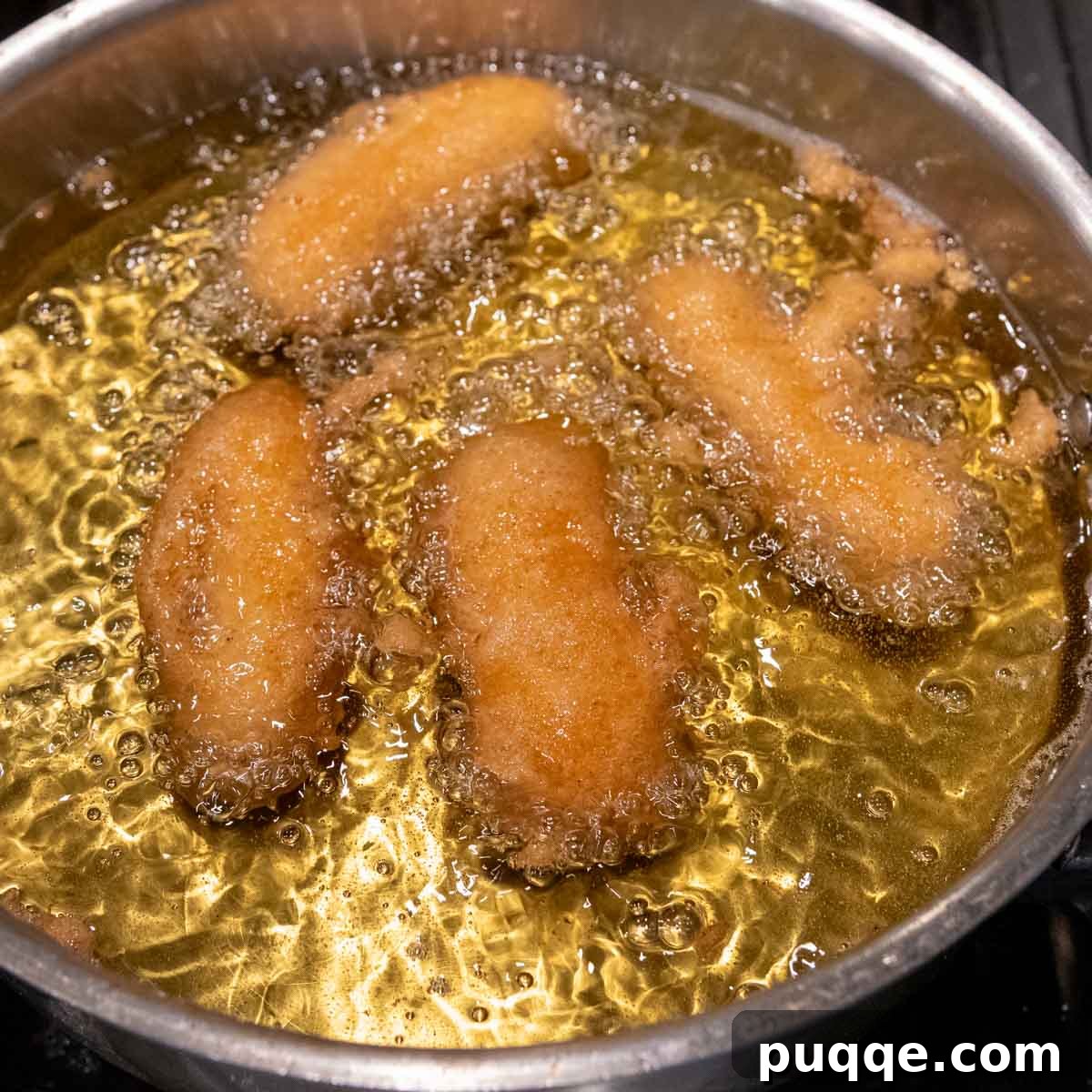 fish cooking in oil.