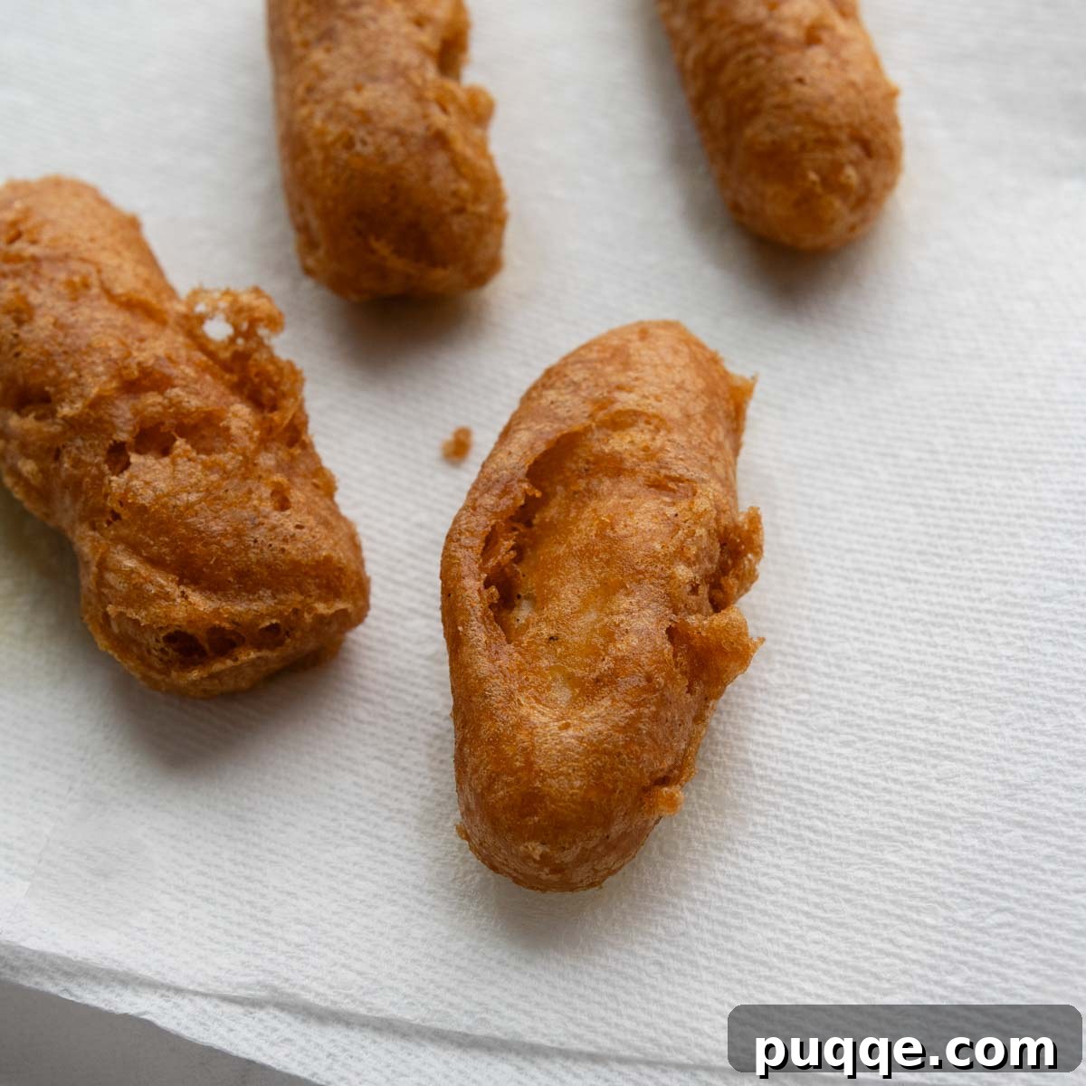 fried fish on a paper towel.