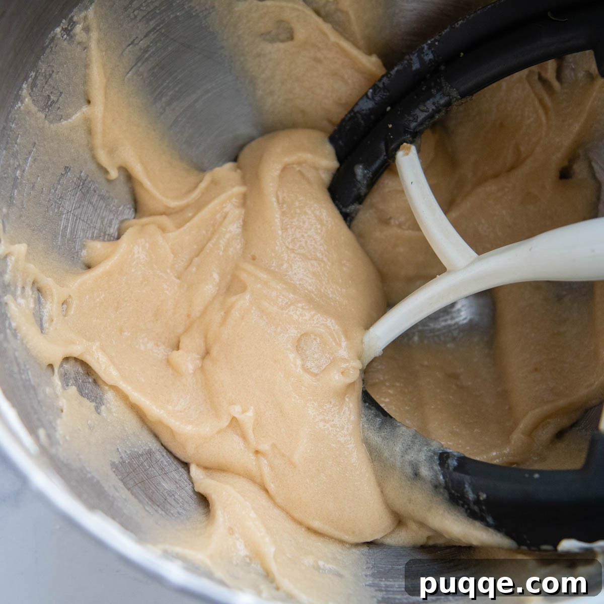 Cloud-Like Gluten-Free Banana Cake 4 The smooth, creamy banana cake batter after sugars, butter, oil, and sour cream are thoroughly combined.