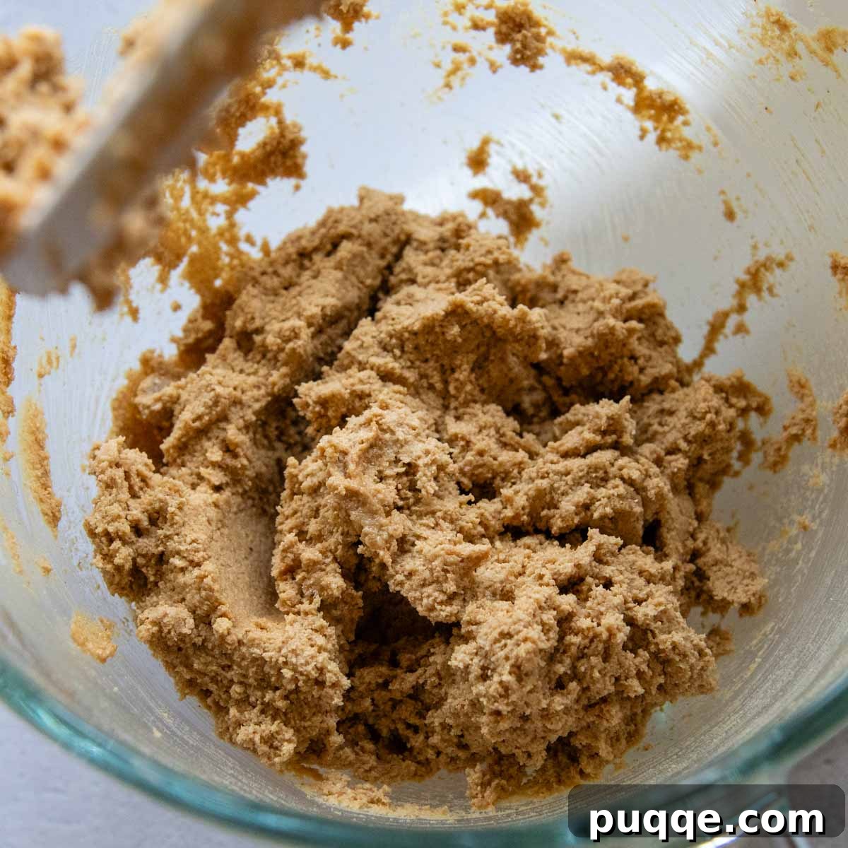 Melt-in-Your-Mouth Peanut Butter Oat Flour Cookies 4 Beautifully mixed peanut butter oat flour cookie dough, thick and ready for scooping, in a mixing bowl.