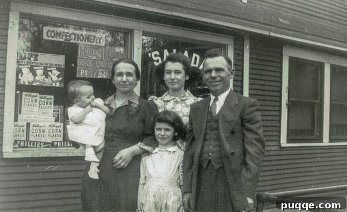 My mom as a baby with her sisters and parents in front of their bustling grocery store in Gary, Indiana
